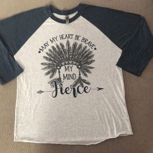 Graphic raglan. 3/4 length sleeves.